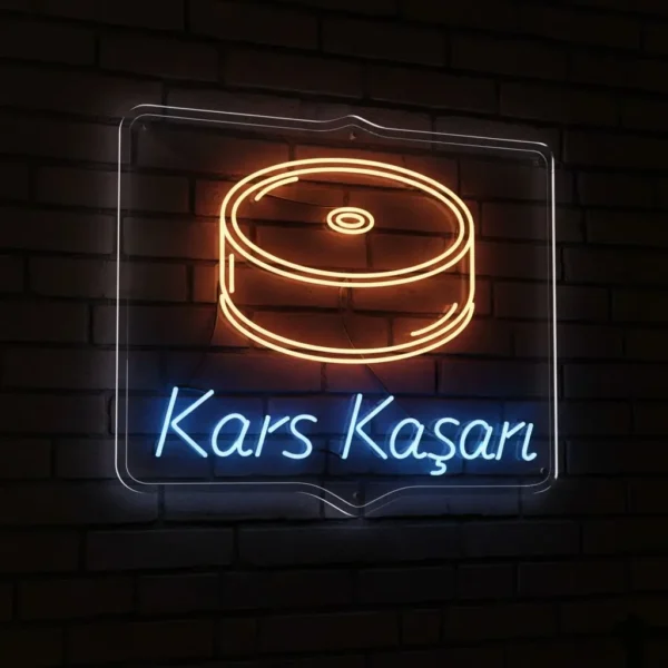 Peynir tekeri figürü ve mavi Kars Kaşarı yazısıyla LED neon tabela