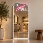 Güzellik salonunda BE you TIFUL yazılı beyaz ve pembe LED neon boy aynası
