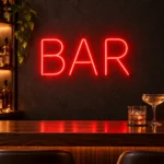 Modern barın koyu gri duvarında kırmızı büyük harfli BAR LED neon tabela